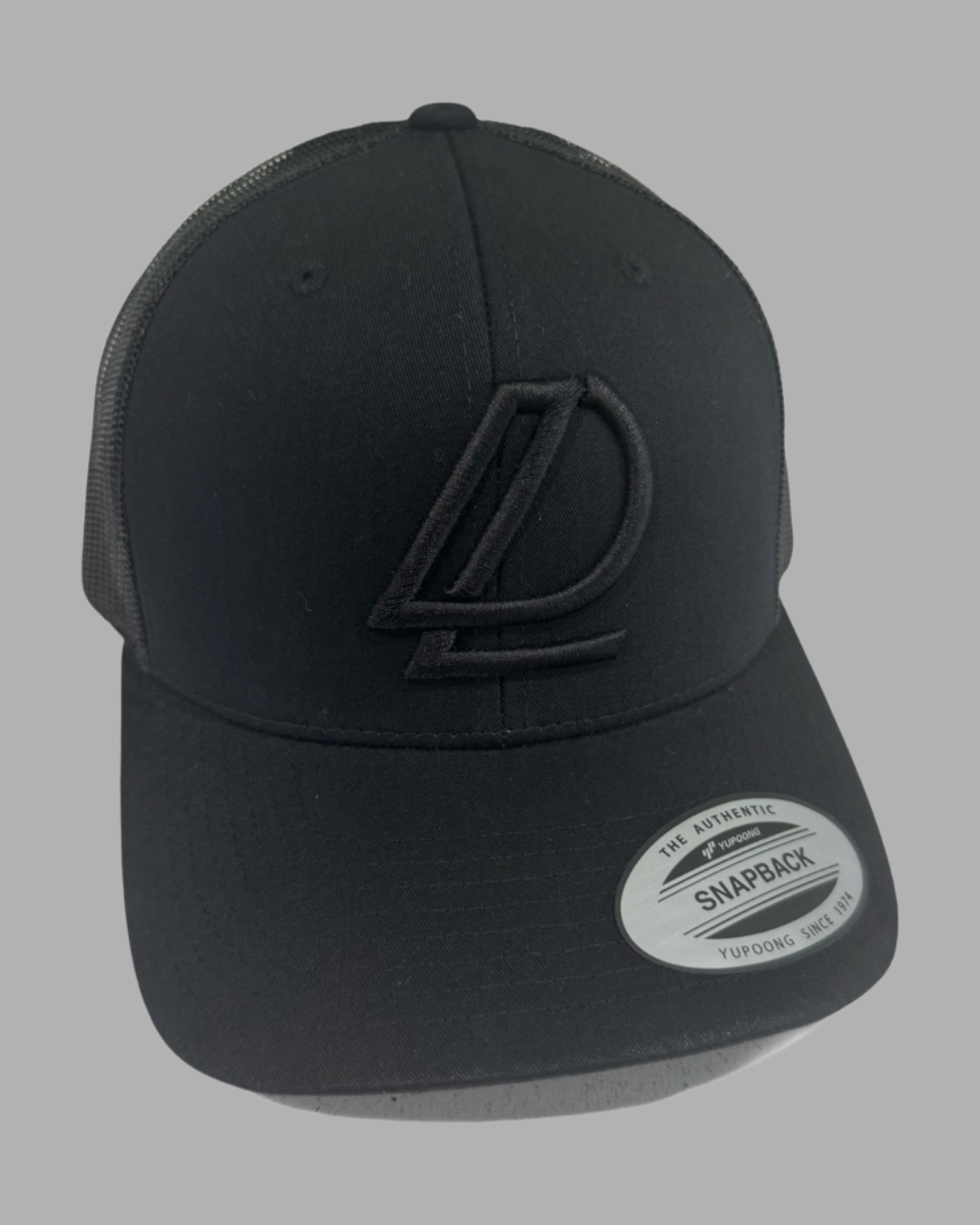 Triple Black Trucker Cap